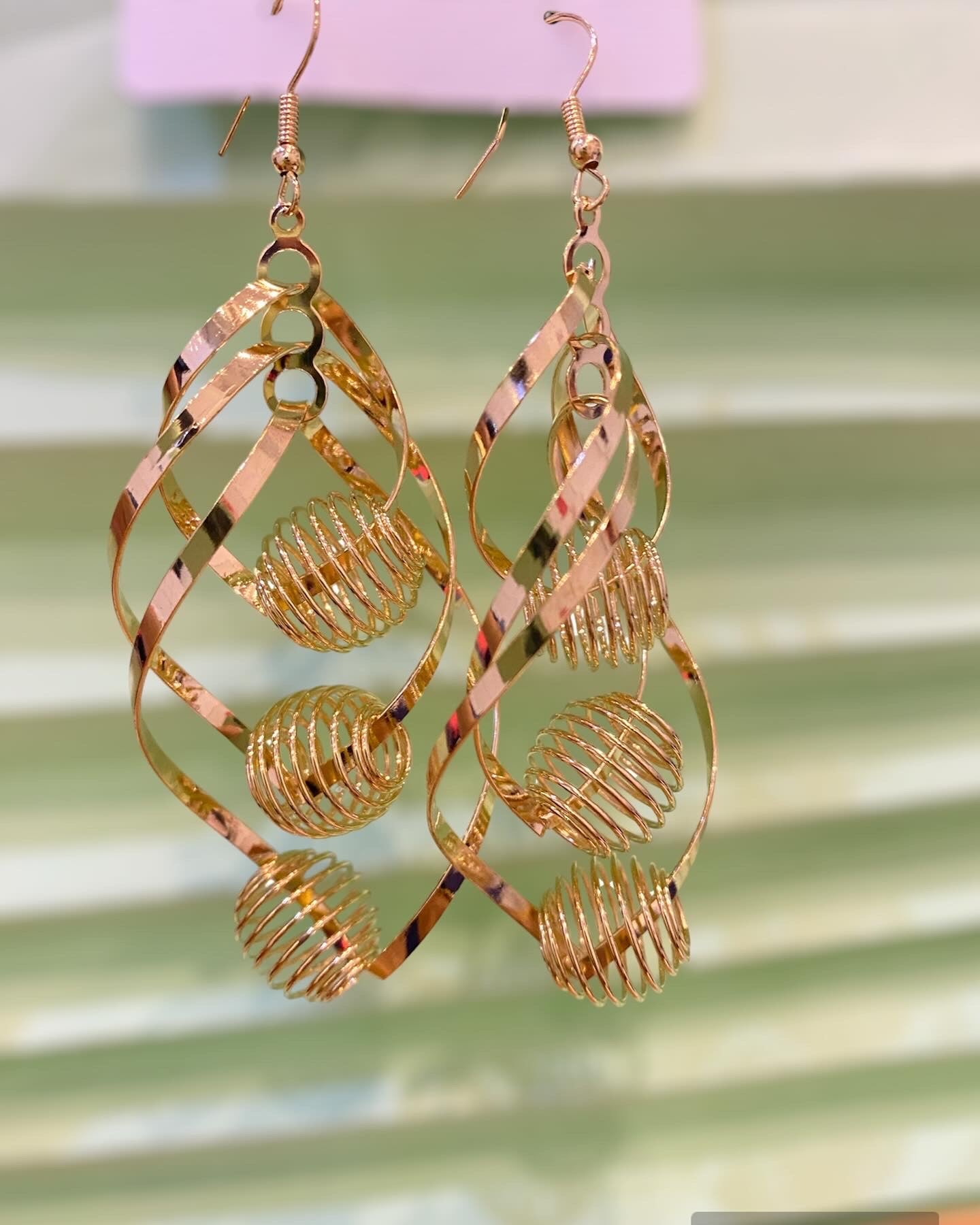 Golden dangling earrings